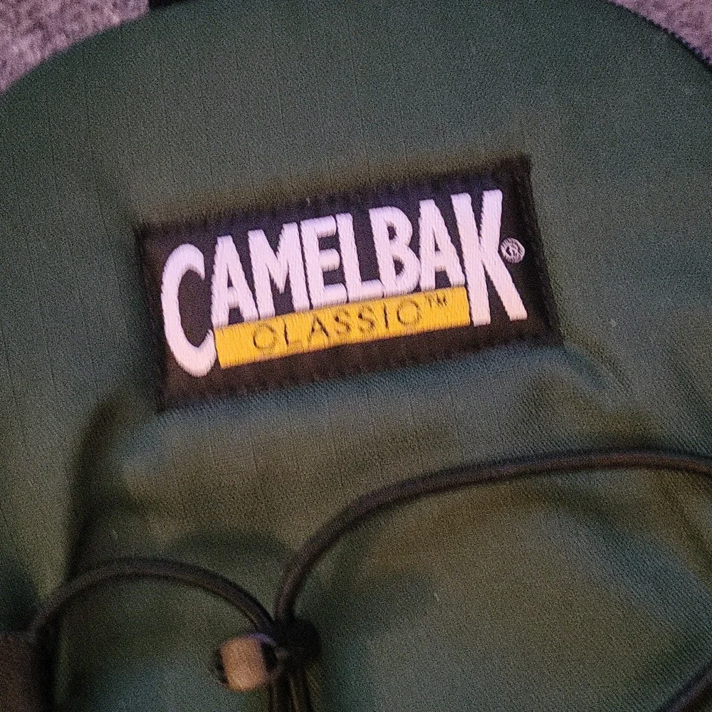 CamelBak Forest Green and Black Backpack.